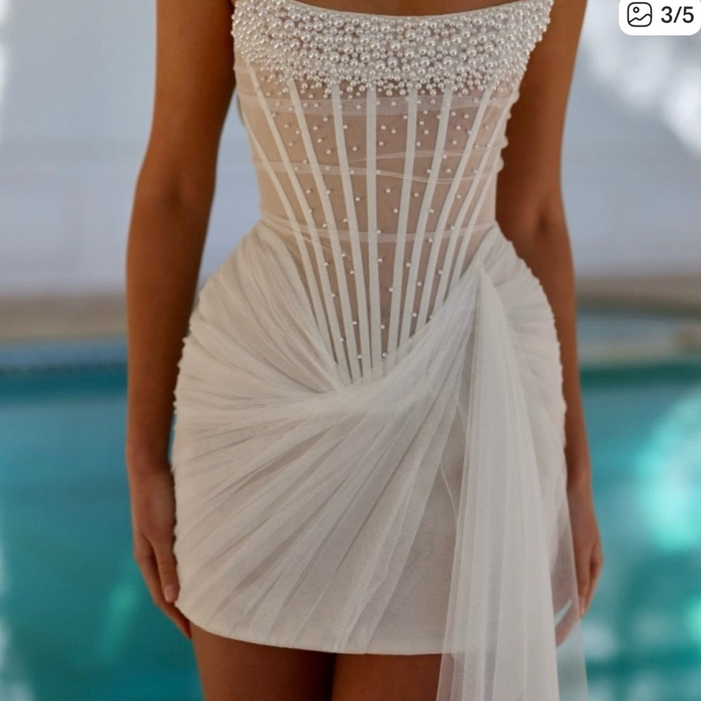 Elegant Pearl-Embellished Ivory Mini Dress